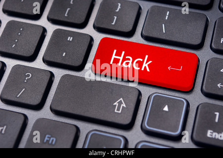 Hack concetti di sicurezza dei computer, con un messaggio sulla tastiera il tasto invio. Foto Stock