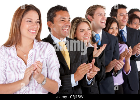 Young business persone in piedi in fila sorridente e applaudire Foto Stock