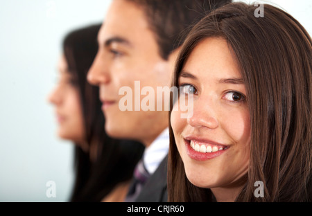 Il team di business con una imprenditrice che lo conducono in un ufficio Foto Stock