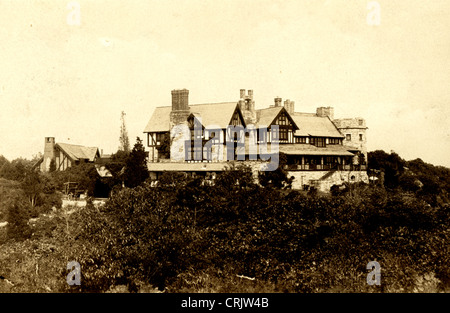 Fortificato spettacolare inglese Tudor Mansion cottage estivi Foto Stock