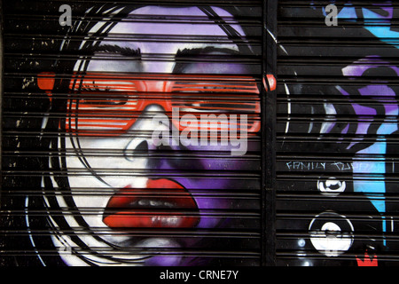 Arte di strada nel quartiere Lapa di Rio de Janeiro in Brasile. Foto Stock