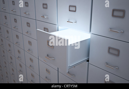 File cabinet con un cassetto aperto e la luce Foto Stock