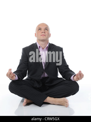 Imprenditore Meditazione yoga in Lotus Foto Stock