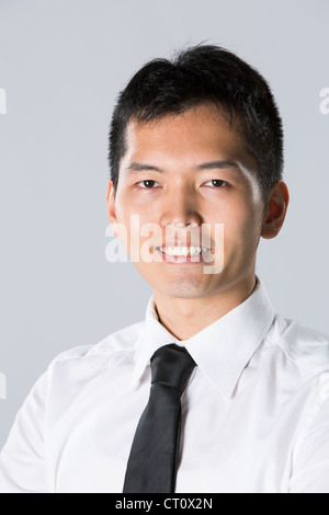 Felice giovane uomo d affari. Foto Stock