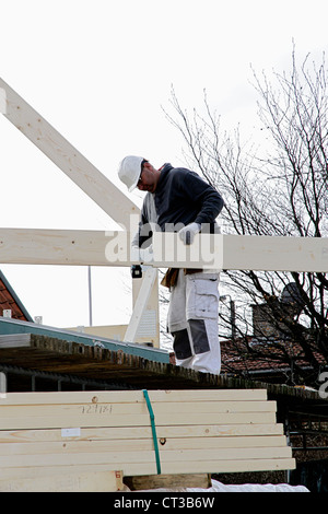 Builder a lavorare sulla nuova struttura Foto Stock