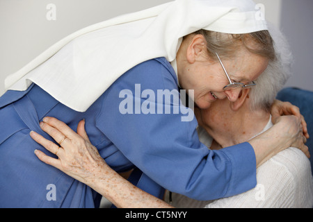 Visita, anziani hosp. Paziente Foto Stock