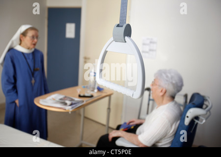 Visita, anziani hosp. Paziente Foto Stock