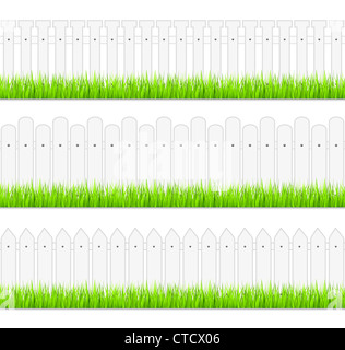 Recinzioni in bianco con l'erba Foto Stock