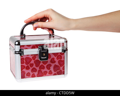 Valigia rossa in mano sullo sfondo bianco. (Isolato) Foto Stock
