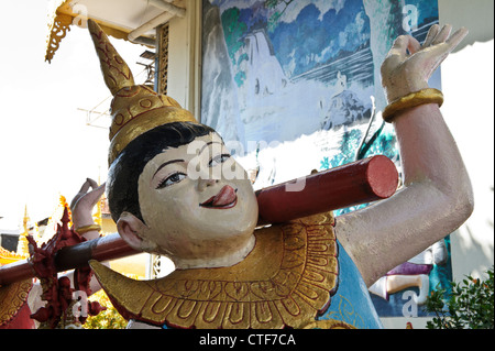 Ridendo bell bearer, Dhammikarama Tempio birmano, Georgetown, Penang, Malaysia. Foto Stock