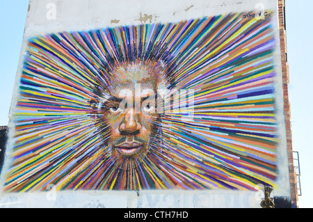 La pittura di Usain Bolt su un muro vicino a Brick Lane, Londra est Foto Stock