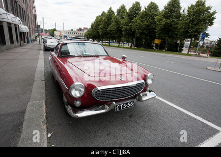 Volvo P1800 nel parco, Finlandia Foto Stock