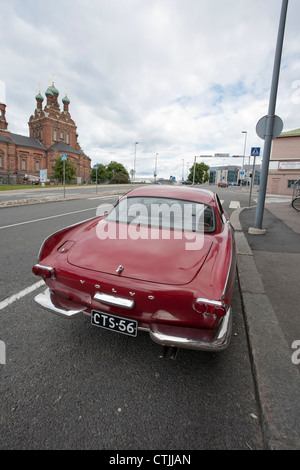 Volvo P1800 nel parco, Finlandia Foto Stock