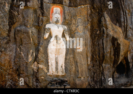 Rock-cut figure di Buddha a Buduruwagala, Sri Lanka Foto Stock