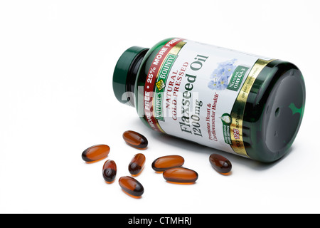 Olio di lino pillola bottiglia, una fonte nutrizionale di omega 3 e di acidi grassi omega-6 Foto Stock