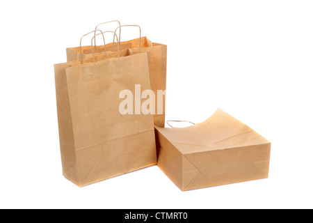 Tre ecologici sacchetti di carta su sfondo bianco Foto Stock