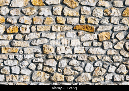 Locale casuale parete in pietra dettaglio - Francia. Foto Stock