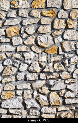 Locale casuale parete in pietra dettaglio - Francia. Foto Stock