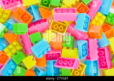Sfondo colorato di mattoni in plastica Giocattoli Foto Stock
