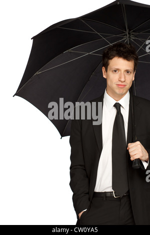 Ritratto di un giovane elegante uomo d affari con ombrellone Foto Stock