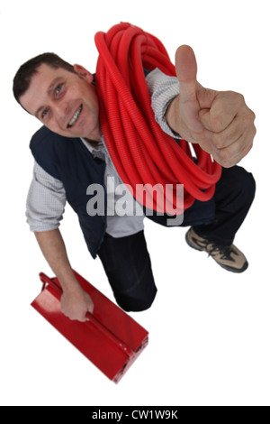 Elettricista dando il pollice in su Foto Stock