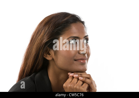 Indian Business donna che guarda alla sua destra. Foto Stock