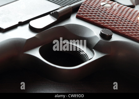 Parte di Colt1911 A1 US Army pistola close-up. Foto Stock