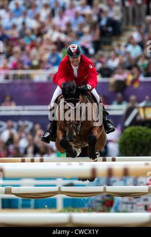 Ian Millar (CAN) riding star power nei singoli Jumping evento equestre presso le Olimpiadi estive di Londra, 2012 Foto Stock