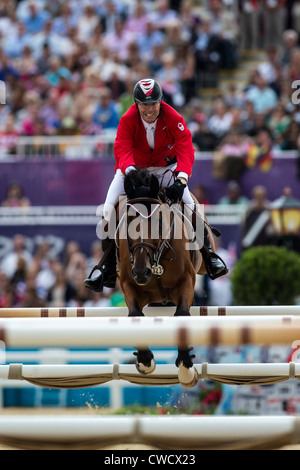 Ian Millar (CAN) riding star power nei singoli Jumping evento equestre presso le Olimpiadi estive di Londra, 2012 Foto Stock