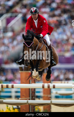 Ian Millar (CAN) riding star power nei singoli Jumping evento equestre presso le Olimpiadi estive di Londra, 2012 Foto Stock