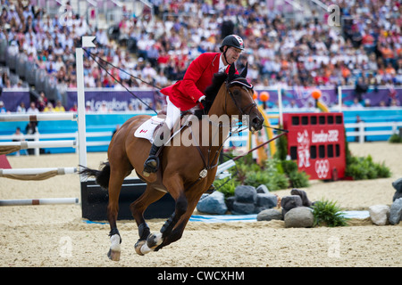 Ian Millar (CAN) riding star power nei singoli Jumping evento equestre presso le Olimpiadi estive di Londra, 2012 Foto Stock