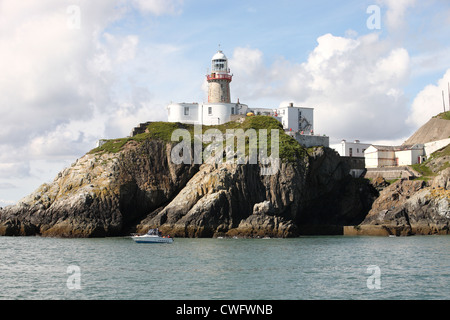 Baily lighthouse a Howth Head, la baia di Dublino Irlanda Foto Stock