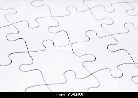 Puzzle in bianco in shallow focus Foto Stock