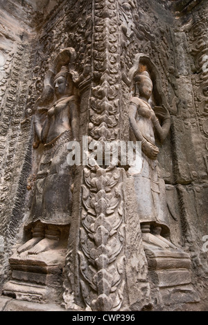 Le sculture del tempio di Ta Prohm, Siem Reap, Cambogia. Il tempio è stata usata nel film Tomb Raider Foto Stock