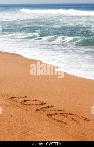 Amore scritta sulla spiaggia Foto Stock