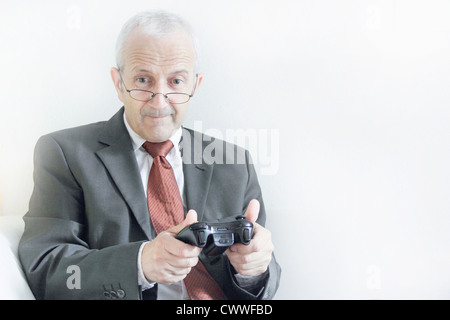 Imprenditore per giocare con i videogiochi Foto Stock
