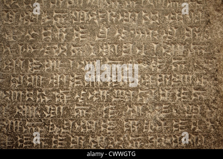 Il cuneiforme scrittura antica sullo sfondo Foto Stock
