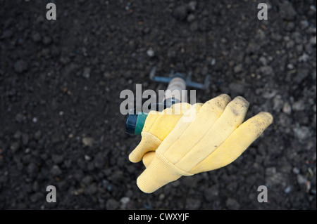 Prendendo una pausa da scavare Foto Stock