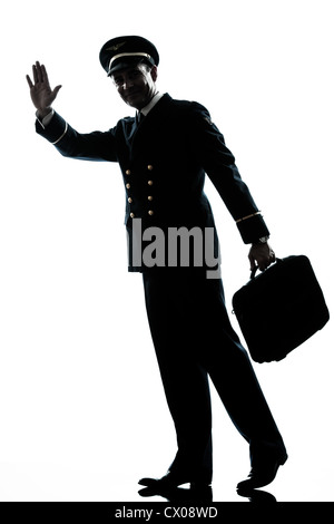 Un uomo caucasico di pilota di linea uniforme in studio isolato su sfondo bianco Foto Stock