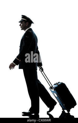 Un uomo caucasico di pilota di linea uniforme in studio isolato su sfondo bianco Foto Stock