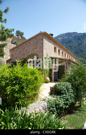 Il percorso di una delle ville private e alberata via in esclusiva 5* La Residencia Hotel, Deia, Mallorca, Spagna Foto Stock