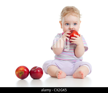 Baby boy mangiare cibo sano isolato Foto Stock