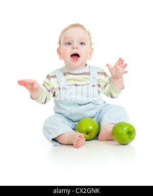 Baby boy mangiare cibo sano isolato Foto Stock