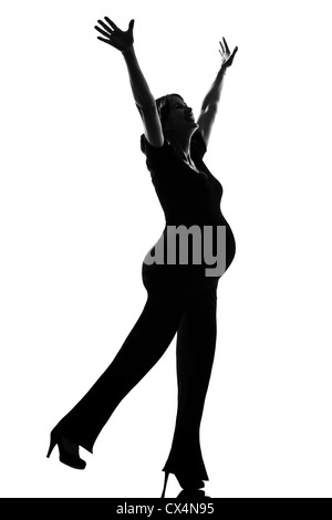 Bella caucasian incinta donna felice in pieno lunghezza silhouette su studio isolato sfondo bianco Foto Stock