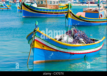 Le barche dei pescatori di Marsaxlokk malta Foto Stock