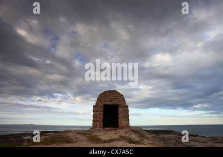 La vecchia casa di polvere a Seahouses sulla costa di Northumberland. Foto Stock