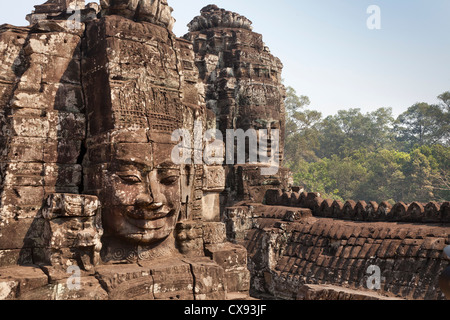 Tempio di Angkor dettagli, incisioni, blocchi, volti sorridenti al bayan, tempio di Angkor Thom, Cambogia Foto Stock