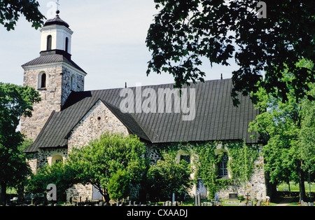 Medievale di pietra grigia la chiesa di S. Andrea situato sull isola di Kimito in Kimitoon, Finlandia Foto Stock