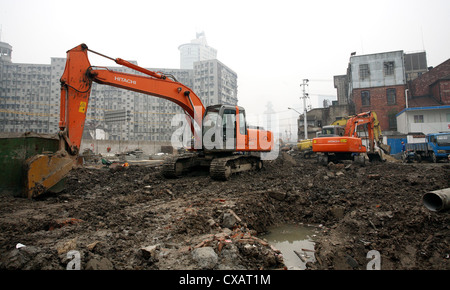 Shanghai, escavatore su un sito in costruzione Foto Stock