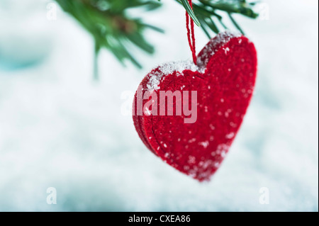 A forma di cuore ornamento di Natale Foto Stock